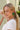 Jana Green Beaded Circle Earrings - close side view of model wearing earrings