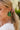 Jana Green Beaded Circle Earrings - close up of model wearing earrings