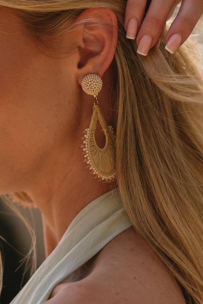 Alyssa Natural Straw Beaded Earrings - close up of model wearing earrings