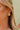 Cameron Gold & Pink Triangle Stud Earrings - close up of earrings on model