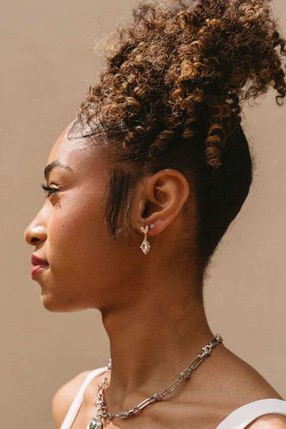 Erica Rhinestone Heart Dangle Earrings - side view on model