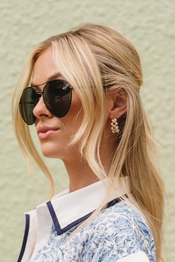 Megan Gold & Pearl Hoop Earrings - side view of earrings on model