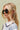 Megan Gold & Pearl Hoop Earrings - side view of earrings on model