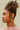 Cady Vintage Floral Bow Earrings - side view of earrings on model
