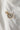 Image shows the 'T' alphabet charm against a white background. Charm is a gold circle with pearlescent center and has gold letter T in the center.