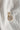 Image shows the 'Z' alphabet charm against a white background. Charm is a gold circle with pearlescent center and has gold letter Z in the center.