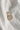 Image shows the 'Z' alphabet charm against a white background. Charm is a gold circle with pearlescent center and has gold letter Z in the center.
