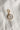 Image shows the 'I' alphabet charm against a white background. Charm is a gold circle with pearlescent center and has gold letter I in the center.