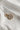 Image shows the 'X' alphabet charm against a white background. Charm is a gold circle with pearlescent center and has gold letter X in the center.