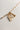 Image shows Leanne Gold Oval Chain Link Bracelet laid out against a white background. Bracelet has has 3 assorted charms attached.