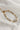 Image shows the Bethany Gold Textured Chain Link Bracelet against a white background. Bracelet has gold textured oval links.