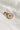 Image shows the 'A' alphabet charm against a white background. Charm is a gold circle with pearlescent center and has gold letter A in the center.