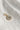 Image shows the 'N' alphabet charm against a white background. Charm is a gold circle with pearlescent center and has gold letter N in the center.