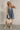 Darcy Washed Denim Pleated Romper - full body front view