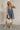Darcy Washed Denim Pleated Romper - full body front view