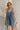 Darcy Washed Denim Pleated Romper - frontal view