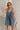 Darcy Washed Denim Pleated Romper - frontal view