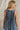 Darcy Washed Denim Pleated Romper - close up back view