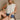 Becca Cream Eyelet Button-Up Tank Top - front view of model sitting