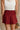 Kelsey Burgundy Pleated Skort - close up back view