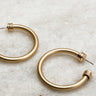 Close up of Hadley Gold Hoop Earrings, brushed gold hoops with pearl end details.
