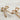 Earrings are shown lying on a neutral background. They are bows with crystal and gold accents. The "ribbons" are made from pink crystals.