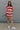 full body view of female model wearing the Bristol Red & White Stripe Sleeveless Top which features Red and Cream Stripe Lightweight Fabric Slits on the side, Round Neckline and Sleeveless