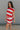 side view of female model wearing the Bristol Red & White Stripe Sleeveless Top which features Red and Cream Stripe Lightweight Fabric Slits on the side, Round Neckline and Sleeveless