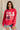 front view of female model wearing the USA 1996 Red Long Sleeve Sweatshirt which features Lightweight Red Fabric, Round Neckline, Long Sleeves, Ribbed Hem and USA 1996 graphic with white, red and blue stitch design