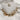 Close up of Taylor Gold Earring Set, set of mini hoops gold earrings include ribbed gold hoops, dimensional gold hoops, roped gold hoops and gold hoops with clear stones.