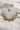 Close up of Taylor Gold Earring Set, set of mini hoops gold earrings include ribbed gold hoops, dimensional gold hoops, roped gold hoops and gold hoops with clear stones.