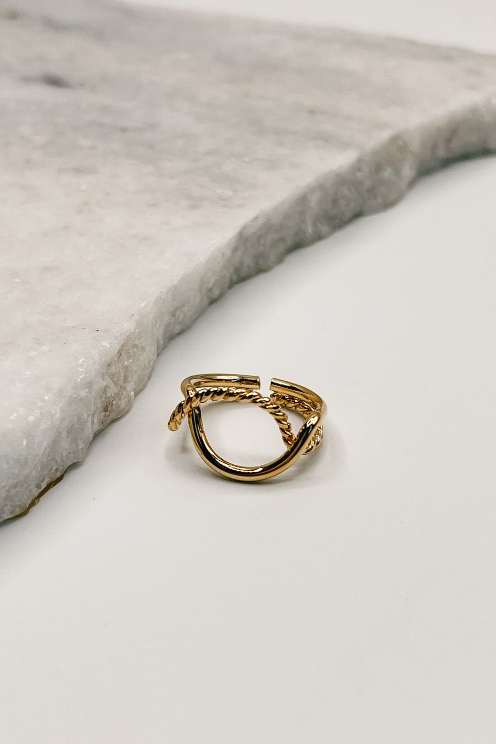  Close up of Allison Gold Roped Ring, that has an open circle.