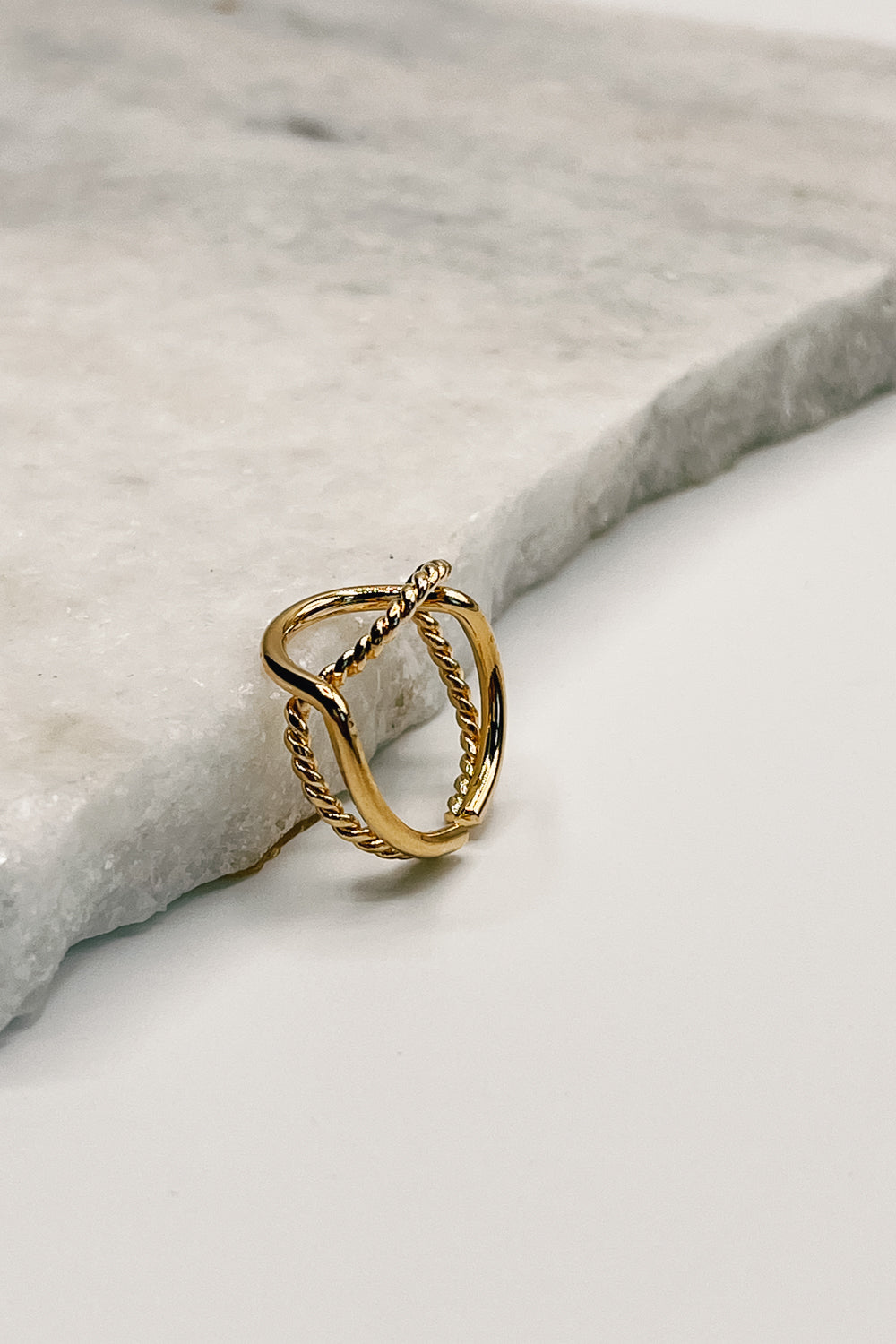 Close up of Allison Gold Roped Ring, that has an open circle.