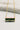 Photo shows a close-up of the LOVE necklace.