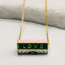 Photo shows a close-up of the LOVE necklace.