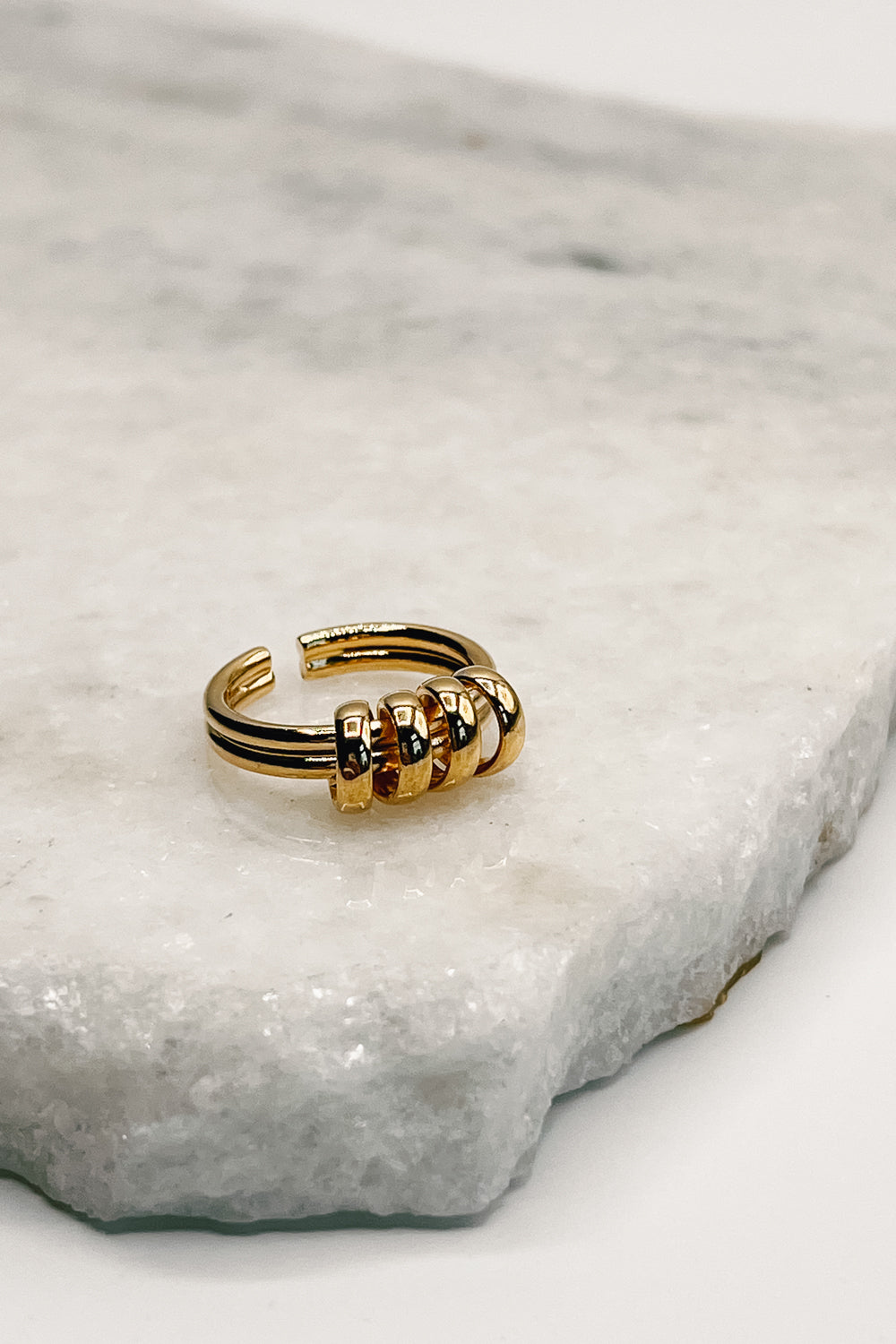 Close up of Jasmine Gold Spiral Ring, gold ring with spiral detail.