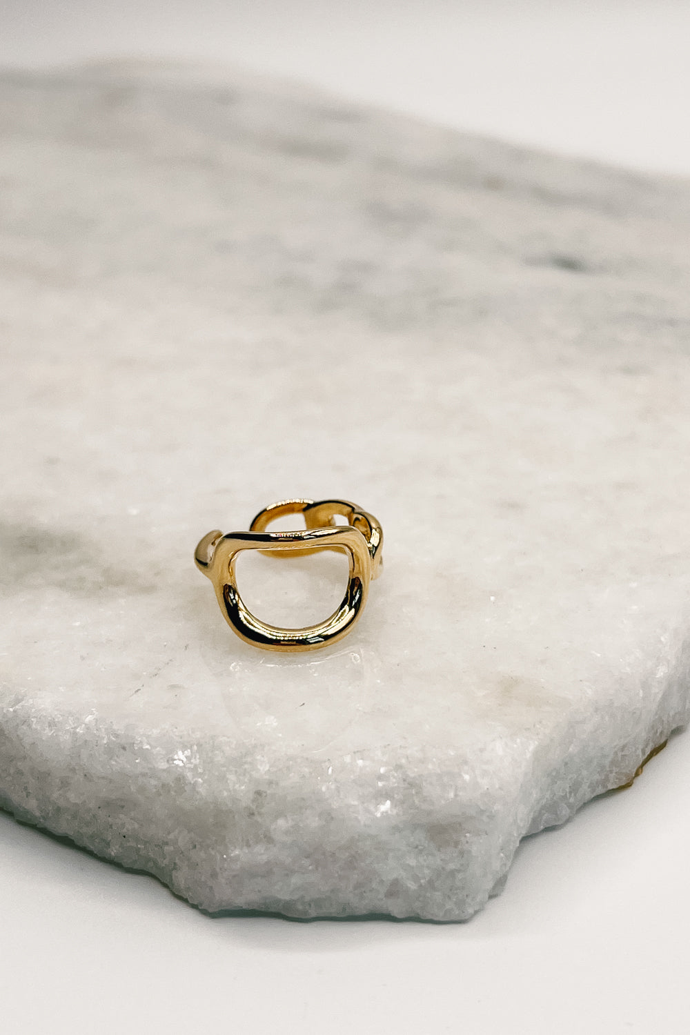 Close up of Natalie Gold Intertwined Ring, a beautifully crafted intertwined ring. 