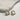 Close up of Caroline Iridescent Clover Studs, iridescent clover studs with gold roped details.