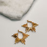 Close up of Kylee Gold Starburst Hoops, gold dipped gold open starburst hoop earrings.