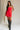 full body view of female model wearing the Amaya Strapless Flare Mini Dress which features Lightweight Fabric, Side Zipper Closure, Belt Loops, Two Front Pockets, Strapless and Shorts Lining. the dress is available in red and navy blue