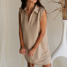 front view of female model wearing the Lena Taupe Ribbed V-Neckline Mini Dress which features Light Taupe Ribbed Fabric, Two Side Pockets, V Neckline with Collar and Sleeveless