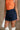 Everleigh Navy Denim Cargo Skirt - frontal side view