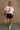 Rowan White, Orange, & Navy "A" Top - full body front view