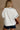 Rowan White, Orange, & Navy "A" Top - close up back view