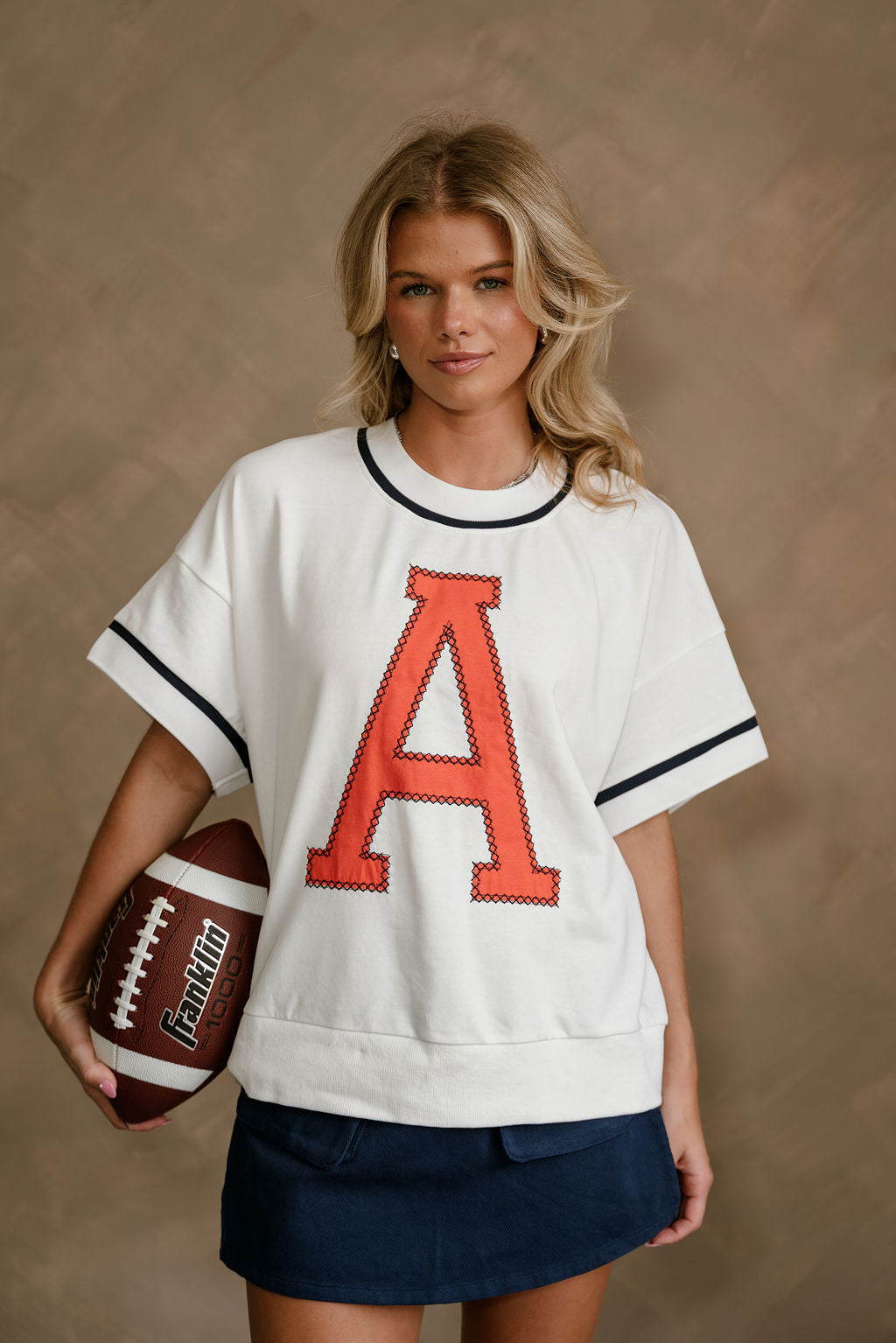 Rowan White, Orange, & Navy "A" Top - untucked front view