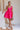 Full body view of model wearing Carly Hot Pink Mini Dress. This is a hot pink mini dress, corset looking top and sleeveless. 