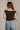 Lila Black & White Polka Dot Top- close up back view