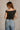 Lila Black & White Polka Dot Top- full back view
