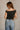 Lila Black & White Polka Dot Top- full back view