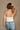 Brooke White & Gold Medallion Halter Tank- close up back view